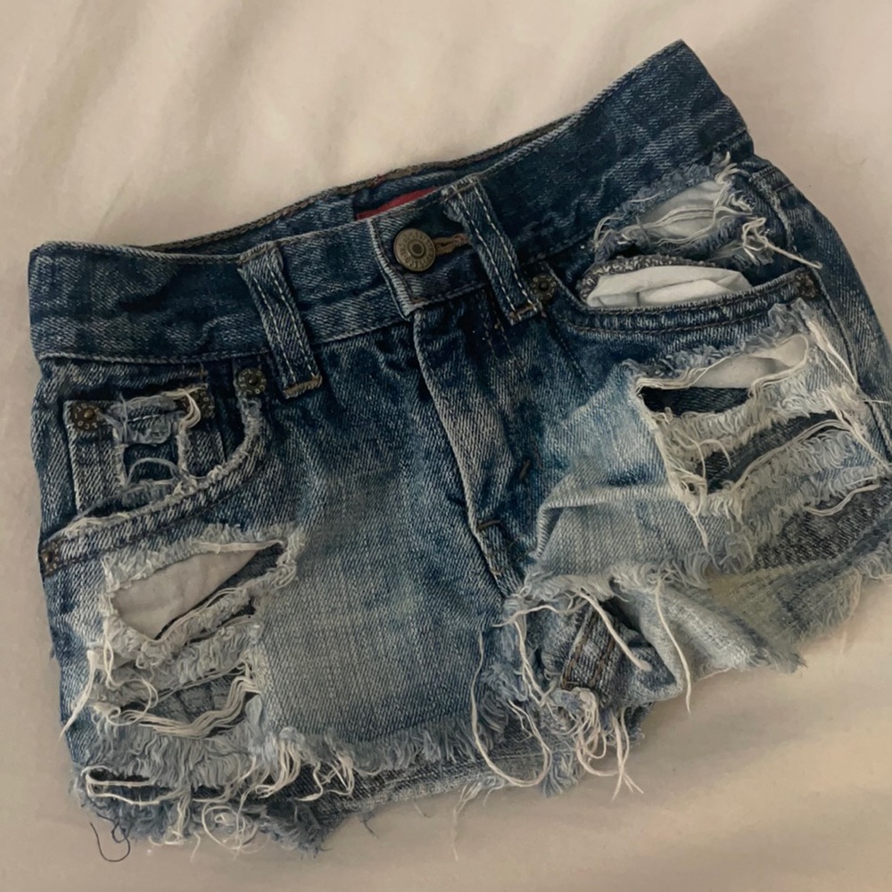 Cutest ever custom destroyed cutoff Levi’s for the littles!